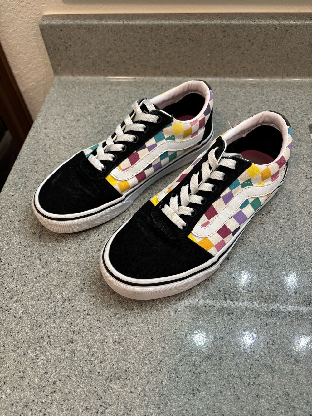 Vans women’s Checkerboard Low-Top Sneakers in Black with Multi Color Check